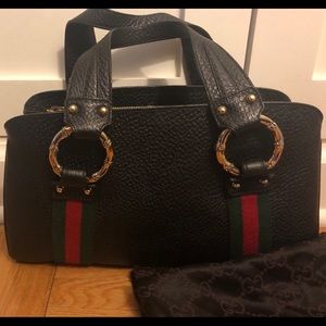 Authentic vintage Gucci leather top handle bag.
